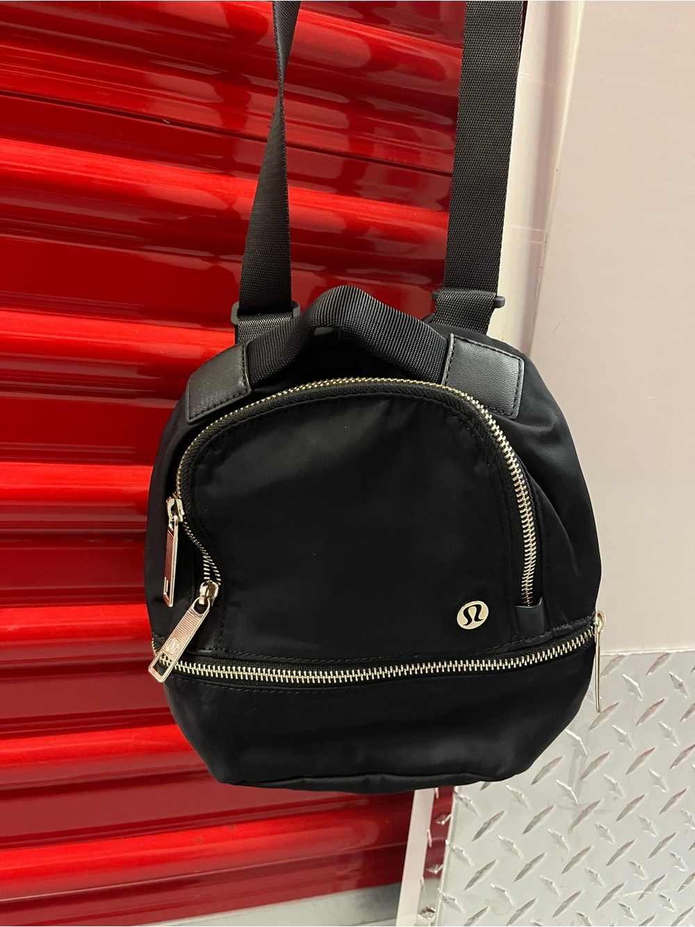 lululemon athletica Black Backpack with Gold Hardware